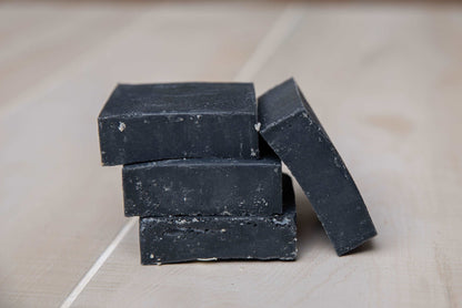 Handcrafted tallow soap with activated charcoal and tea tree oil

